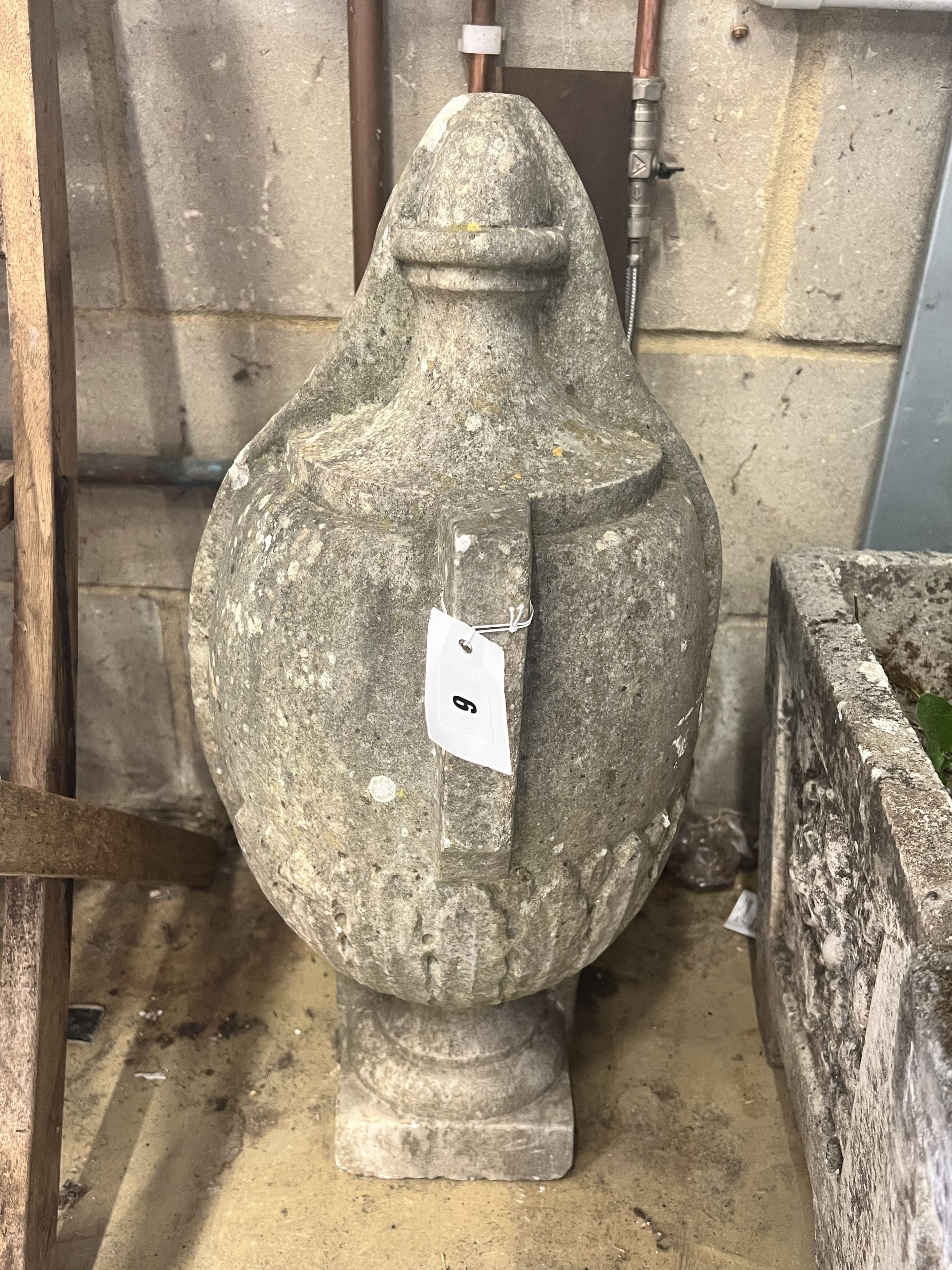 A reconstituted stone vase garden ornament, height 66cm